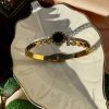 18K Gold-Plated Anti-Tarnish Handcuff Bangle with Black Enamel Circle